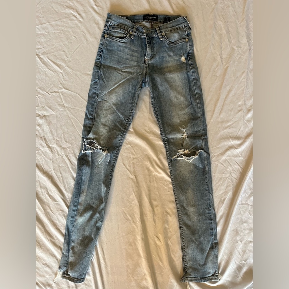 Lucky Brand mid rise ripped skinny jeans size 0/25